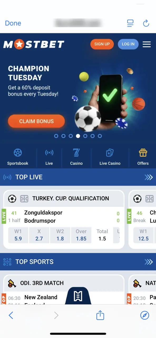 Open Mostbet page on iPhone.